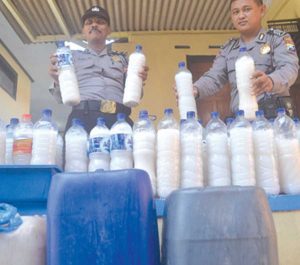 Shop raid, Police confiscate three jerry cans of tuak