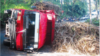 A sugar cane transport truck overturned in Mount Kumitir