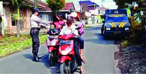 Polisi Akan Tindak Pemotor Tanpa Masker