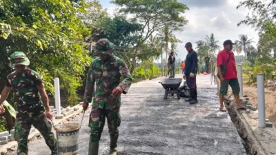 satgas-tmmd-125-kodim-0825/banyuwangi-bangun-jembatan-penghubung-di-siliragung,-permudah-akses-warga