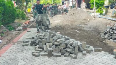 gaspol!-satgas-tmmd-kebut-paving-jalan-ke-jembatan-siliragung,-akses-warga-makin-mulus