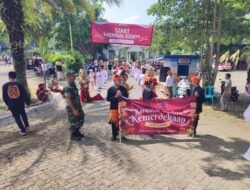 Jaga Kondusifitas Pawai Budaya di Glagah Libatkan Anggota Kodim 0825 Banyuwangi