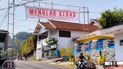 heboh!-warga-prigen-pasang-banner-tolak-real-estate-di-kaki-gunung-arjuno-welirang