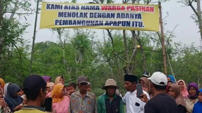 warga-pasuruan-pasang-benner-tolak-pembangunan-sekolah-tamtama-marinir,-tni-al-bilang-begini