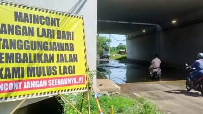 jalan-rusak-imbas-proyek-tol-probowangi,-warga-probolinggo-pasang-banner-protes-tuntut-perbaikan