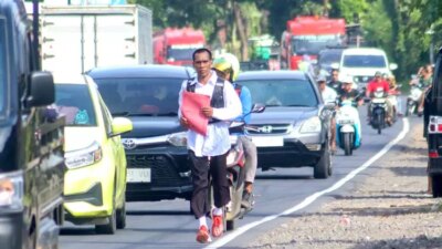 nazar-terbayar-sk-pppk,-penjaga-sekolah-di-banyuwangi-lari-52-km-dari-kota-hingga-glenmore
