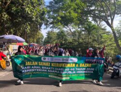 Semarak HAB ke-80, Ribuan Peserta Padati Jalan Sehat Kerukunan dan Bazar UMKM Kemenag Banyuwangi di GOR Tawangalun